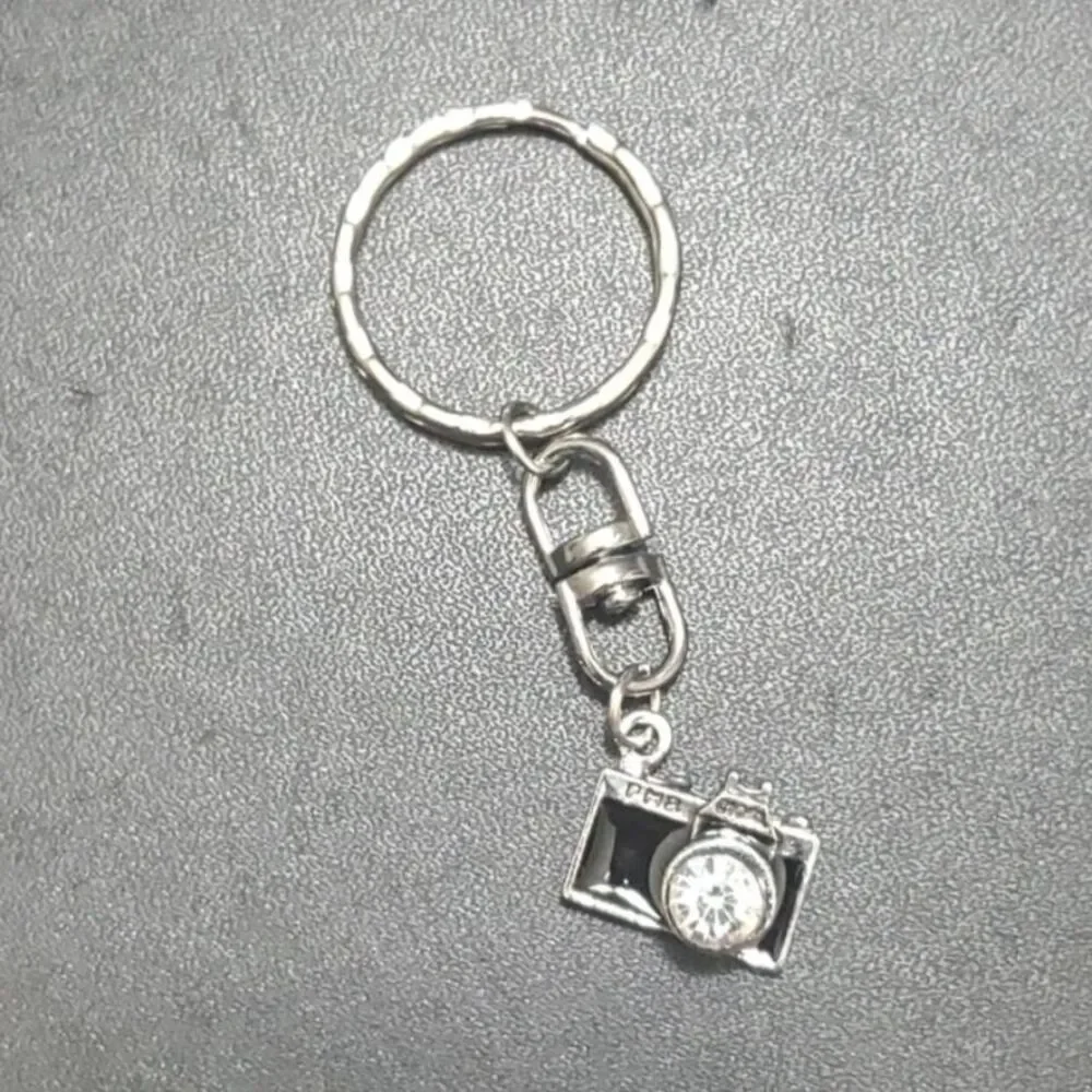 Silver tone camera key fob